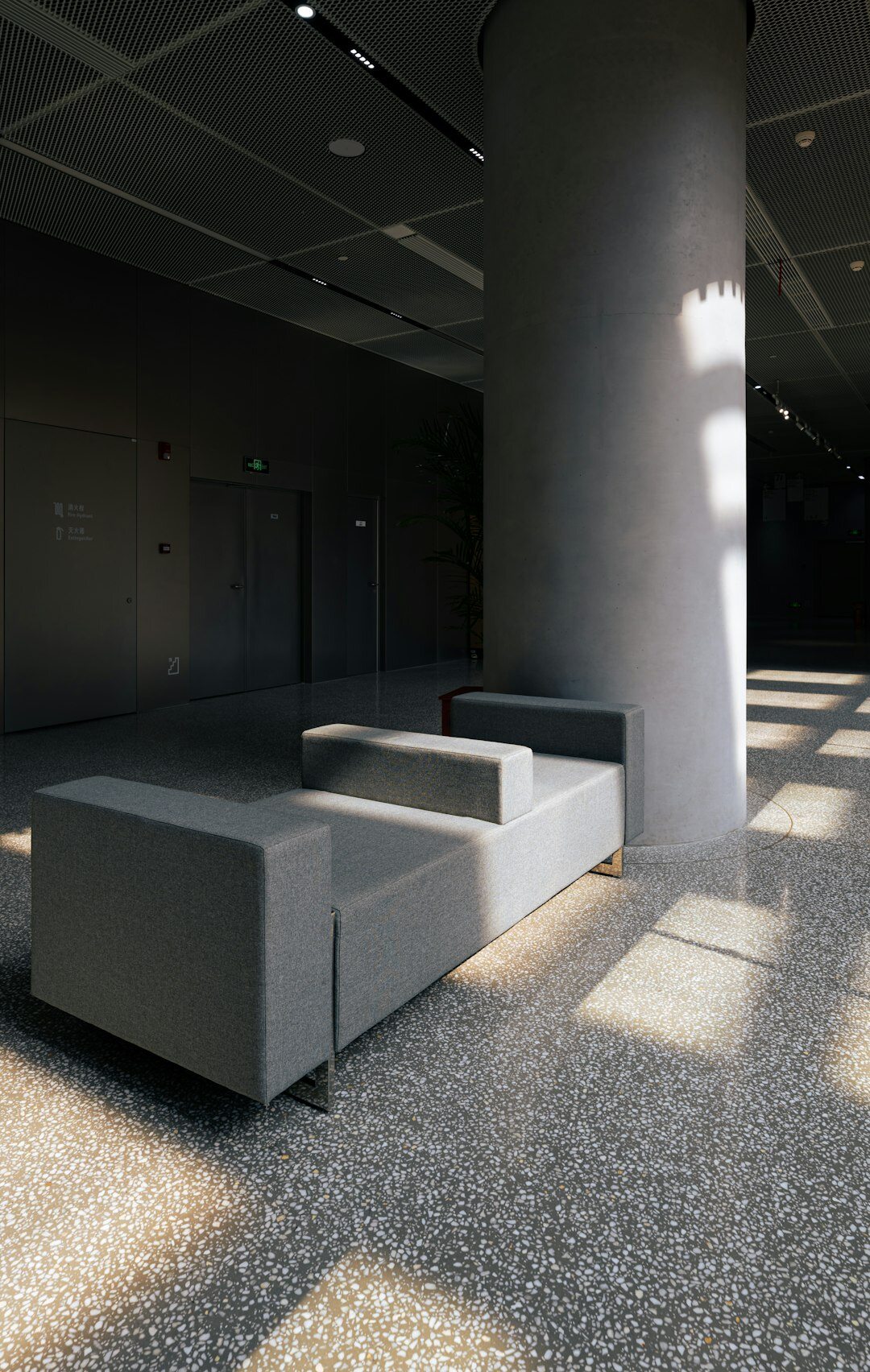 Bright modern office reception area with seating
